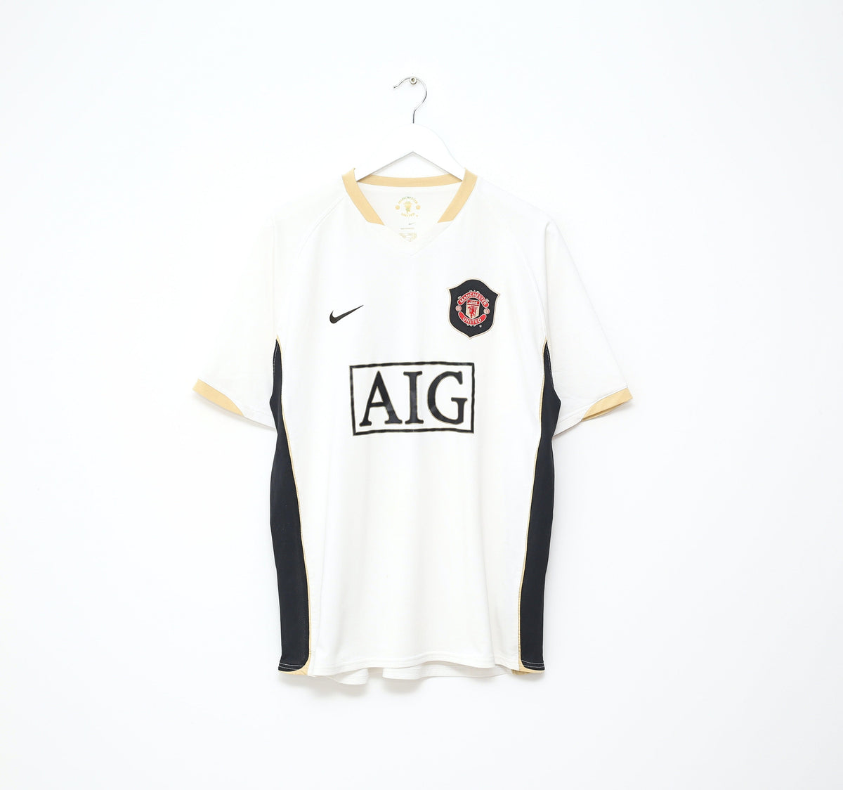 2006/08 Ronaldo #7 Manchester United Nike away football shirt in white with black and gold trim
