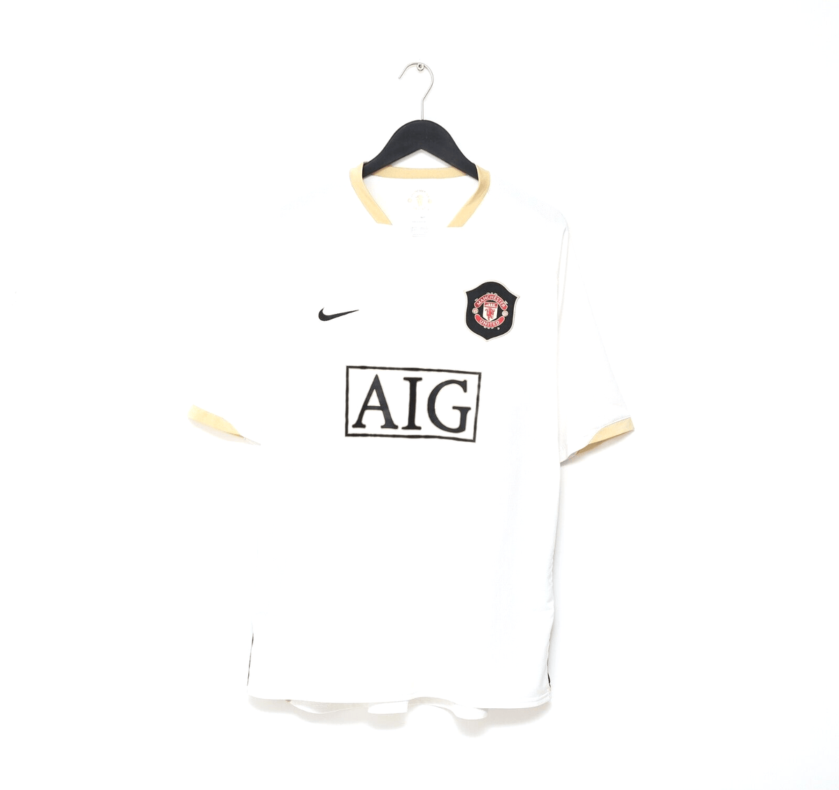 2006/08 Manchester United Nike third football shirt in white with gold collar