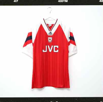 Red sports jersey with 'JVC' and 'WRIGHT 8' on a white background